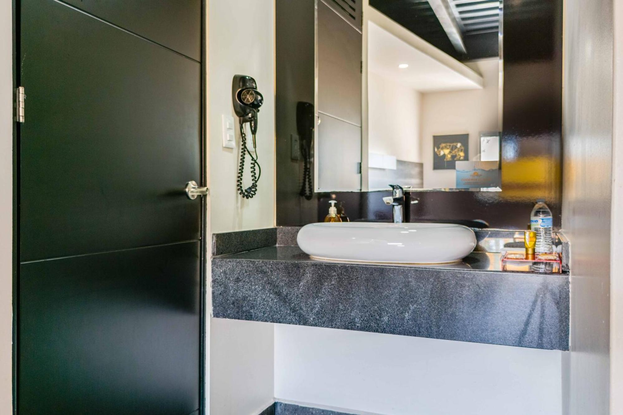 Homesuites Malecon Hotel